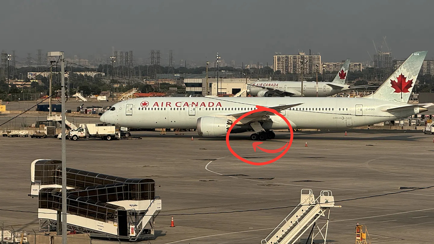Passengers baffled and confused after screams burst from beneath taxiing Air Canada plane