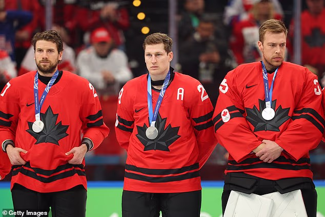 A Canadian hockey star is drawing backlash after appearing visibly upset when handed a stuffed toy following the gold medal loss to the United States